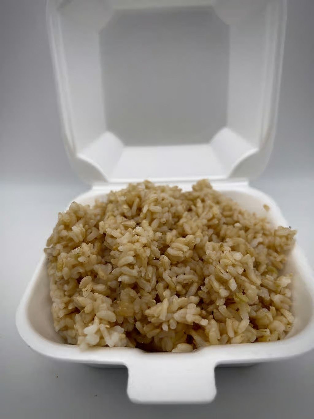 Side steamed brown rice bowl.