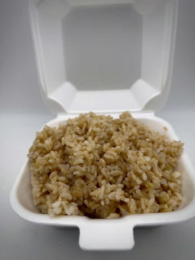 Side steamed brown rice bowl.